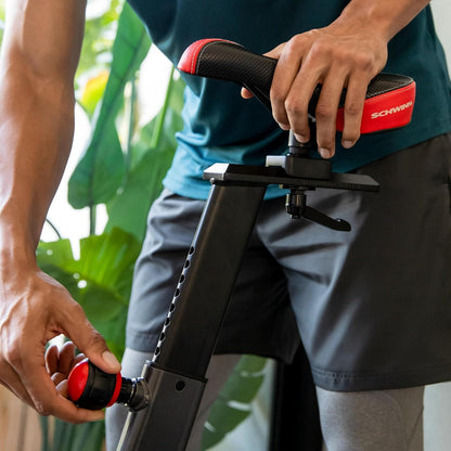 Adjustable Indoor Cycling Bike – 100-level magnetic resistance, silent belt drive, Bluetooth-connected apps (Peloton/Zwift), 4-way seat/handlebars, backlit LCD console, max 330 lbs. Ideal for home gym.